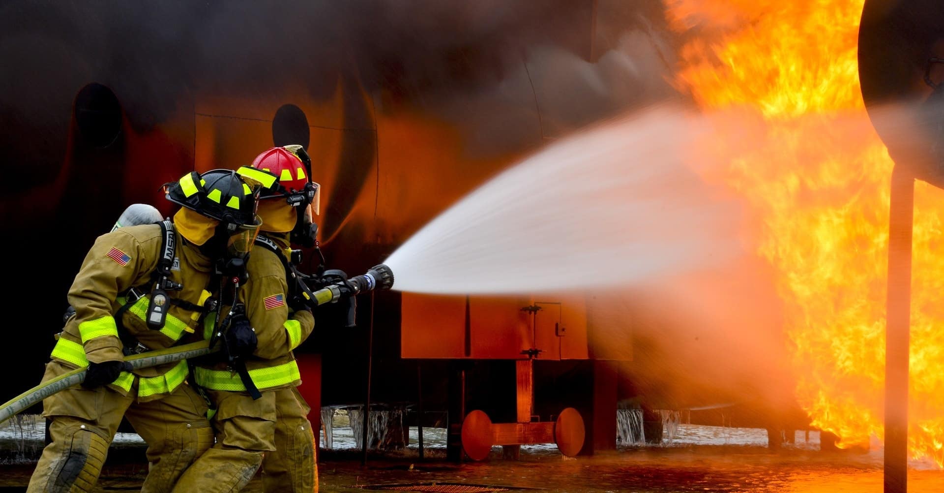 Fire Safety Personnel trying to quench fire. Credit to Pexel pictures