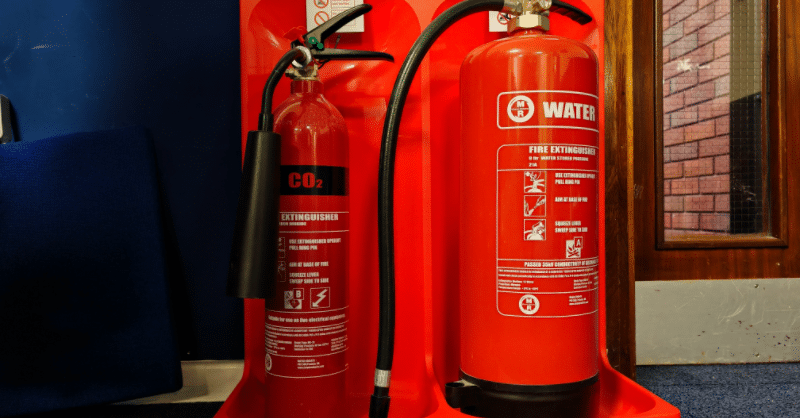 Fire Safety equipment at Caring for Care -Co2 and water fire extinguishers