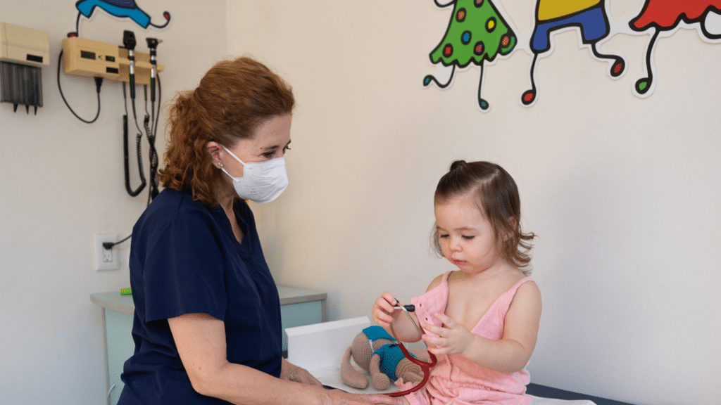 nurse support a child during session